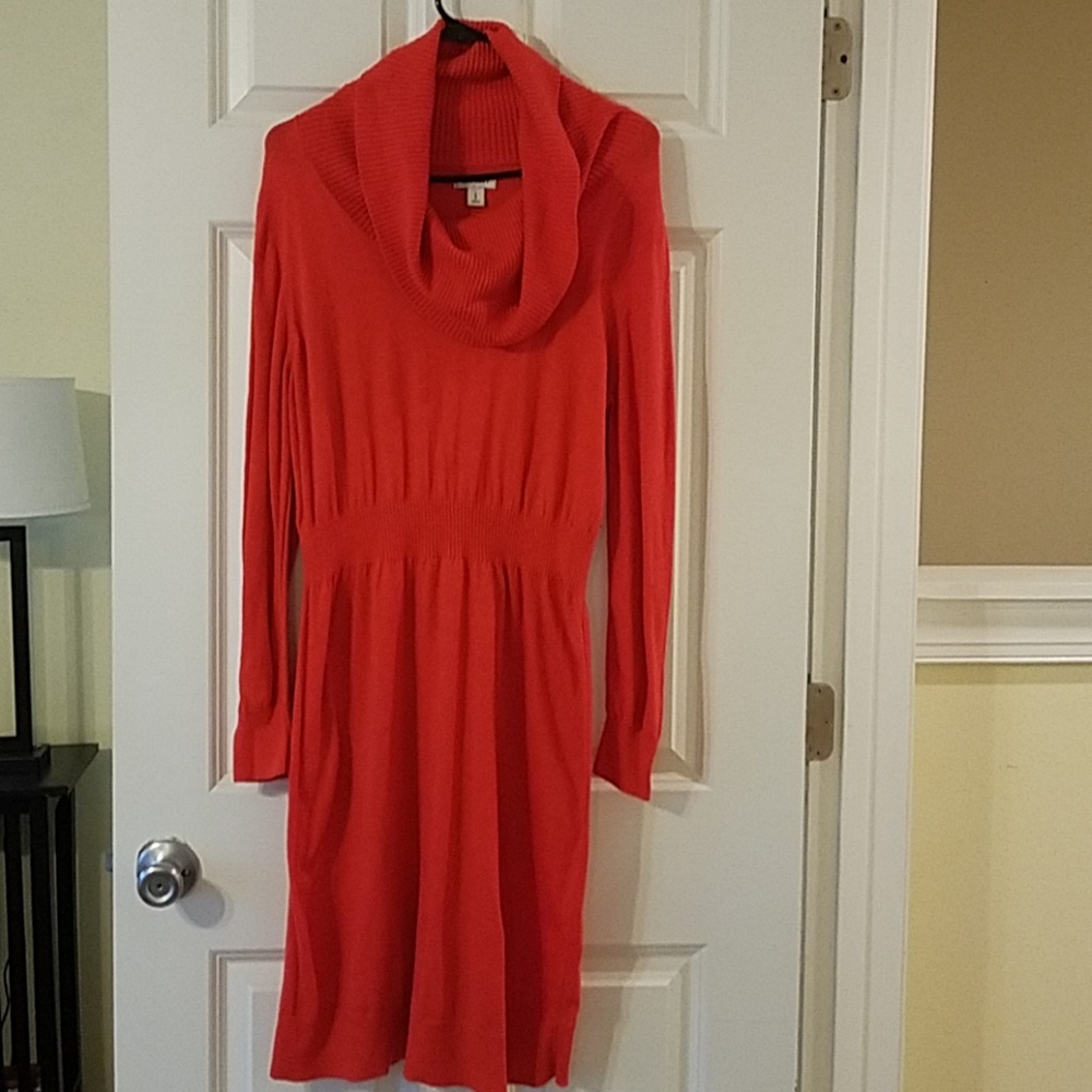 Orange cowl neck sweater dress.